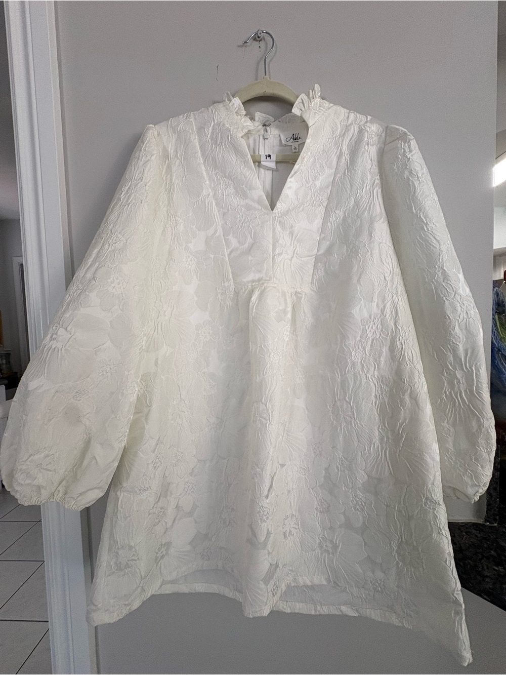 Able White Topwith Textured Label Detail
